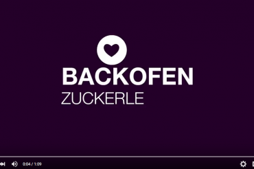 YouTube Screenshot zeigt Logo und Schriftzug von "Backofen Zuckerle" in weiß auf lila Hintergrund. Feigefotodesign